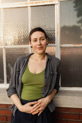Portrait of Maggie Jones Boyle, LPC, therapist and evolutionary astrologer in Lawrence, KS.